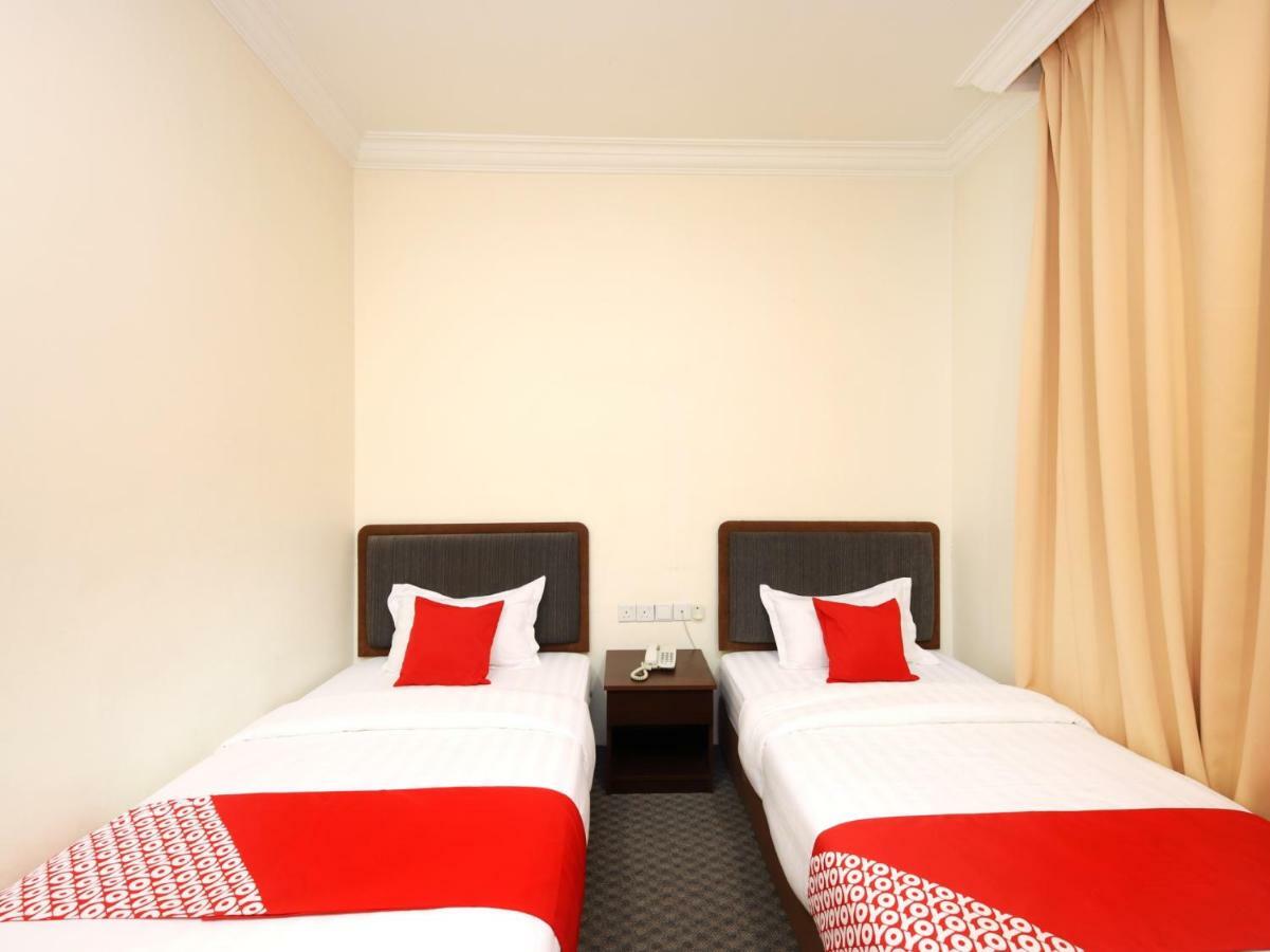 Oyo 750 Comfort Hotel Кота Кинабалу Екстериор снимка